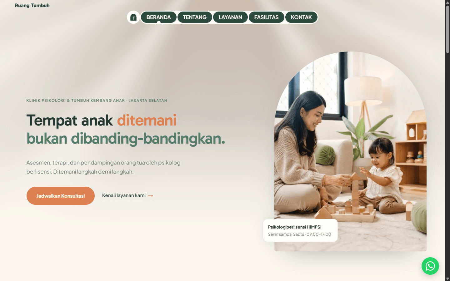 Website Ruang Tumbuh dalam frame laptop